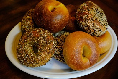 A plate of assorted bagels. 